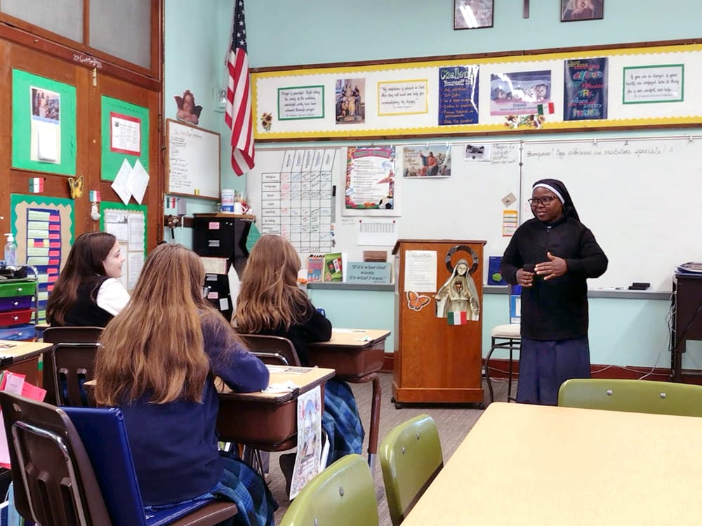 Sister visits one of the classrooms and tells the students about her journey to traditional Catholicism from being a Novus Ordo Sister in Nigeria.