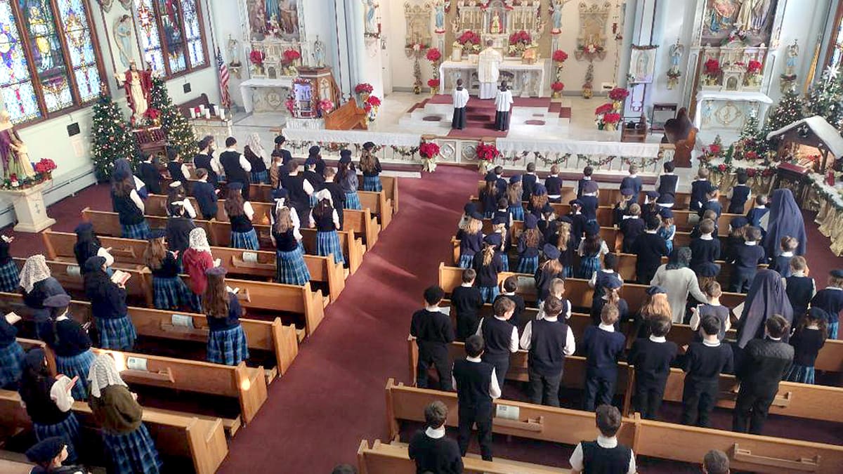 The closing Mass of Catholic Schools week was a high Mass on the Feast of St. John Bosco, sung by the entire student body.
