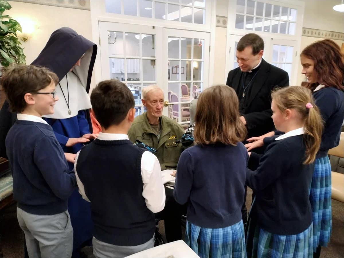 Twice a month, the Sisters from Maine and Father Gabriel Lavery, CMRI, visit a local retirement home to pray the Rosary and visit with the residents.