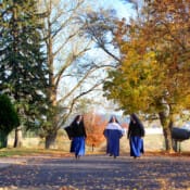 On a recreational walk, three Sisters enjoy the beautiful fall colors during Spokane’s Indian summer. A walk on a beautiful autumn day at Mount St. Michael