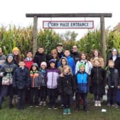 The first quarter was a busy one for St. Philomena’s Academy in Middleville, Michigan. Activities included the All Saints’ Day celebration (top), and a visit to a corn maze. Students and Sisters at the corn maze