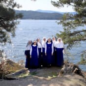 Rev. Mother joined the novitiate Sisters for a
hike around Lake Coeur d’Alene and a group
photo overlooking the water. Novitiate Sisters at Lake Coeur d' Alene