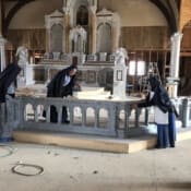 Little by little, work on the church at St. Joseph’s Parish in Olathe, Colorado. progresses. The Sisters stationed there take time to work on communion rail. Sisters working on the communion rail in the new church