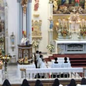 His Excellency gives a sermon during the pontifical high Mass
