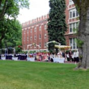 Lovingly prepared shrines and floral archways grace the processional path honoring our Divine Lord on the feast of Corpus Christi.