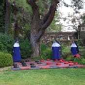 While many Sisters played board games in the gazebo on a recent outing, a few ventured onto the giant checkerboard.