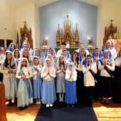 Many earnest lovers of Mary pose for a photo after the Sodality advancement at Mary Immaculate Queen Church in Rathdrum, Idaho. Many earnest lovers of Mary pose for a photo after the Sodality advancement at Mary Immaculate Queen Church in Rathdrum, Idaho.