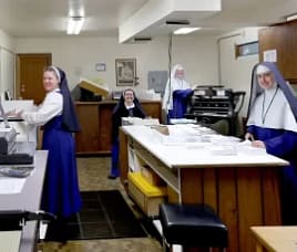 Four steps in pamphlet production: Sr. Dymphna Marie collates the covers, Sr. Virginia folds the pamphlets, Abigail staples them and Sr. Mary Gertrude makes the final trim.