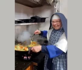 Sr. Mary Bridget stir-frying up a storm -- everyone gets a turn in the kitchen during the Christmas holidays.