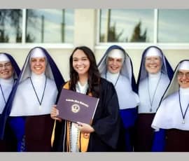 Rev. Mother and Sisters from our Wayne, Michigan, and Olathe, Colorado, missions with former student, Maddie Kraus, as she graduates from Nursing School.