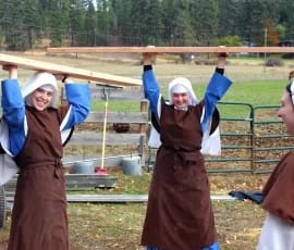 Novices show their enthusiasm for the chapel building project.
