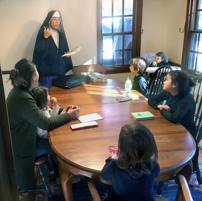 Sister Maria Ines conducts a catechism class.