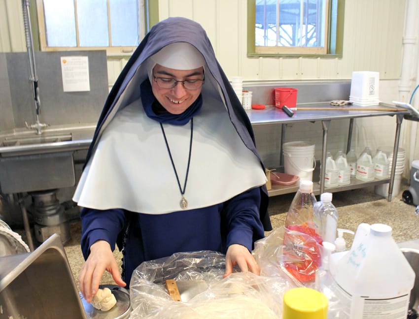 Sr. Bernardine Marie mixes the pretzel dough.