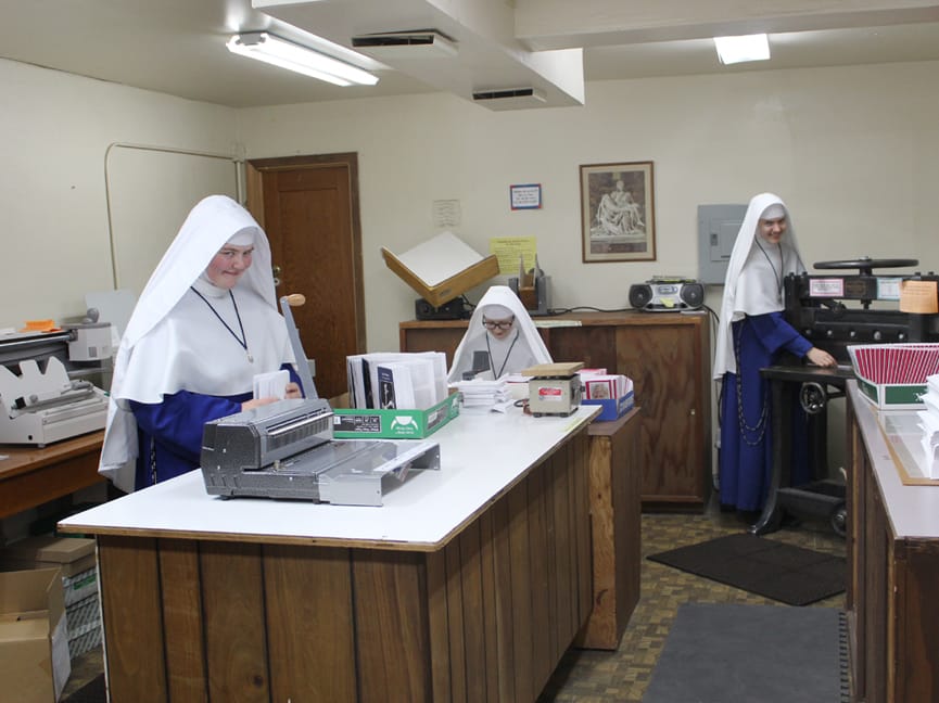Sister novices working in the bindery.
