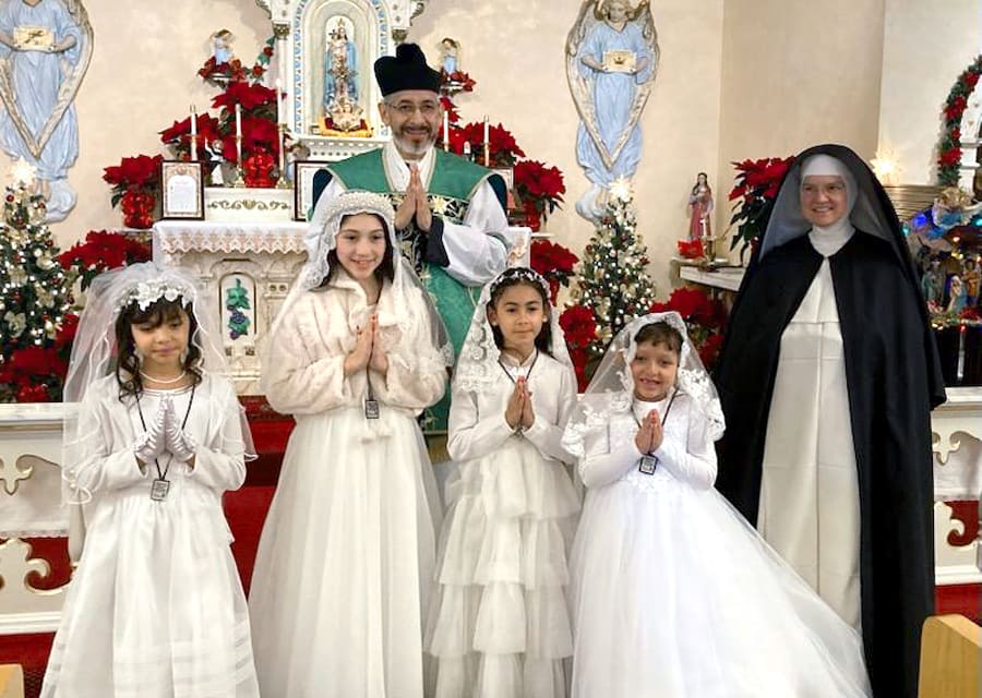 Fr. Ephrem Cordova, CMRI, Sr. Mary Cabrini, O.P., and First Communicants at Queen of the Rosary Church (Phoenix, AZ)