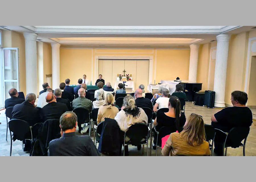 Fr. Eugen Rissling, speaking in English with a Polish translator, gives a public lecture in Warsaw, Poland, at the invitation of the faithful of Fr. Rafal Trytek. (The lecture may be viewed at www.CMRI.pl.)