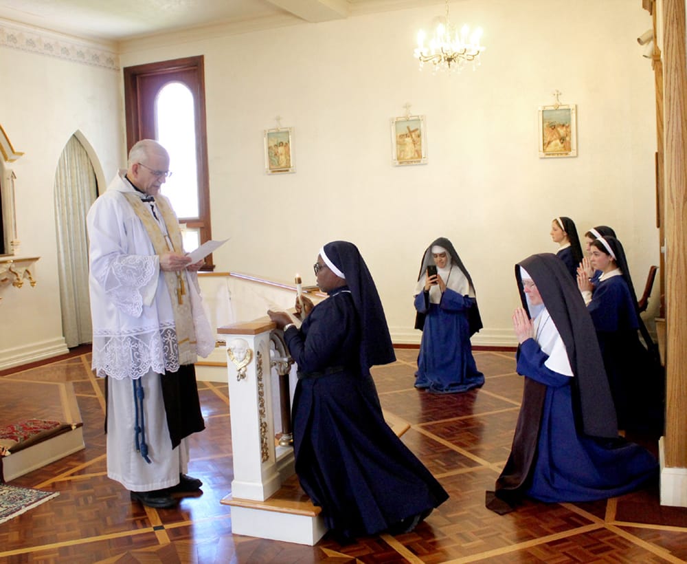 Sister Immaculata, who has come to us from Nigeria, is received as a postulant of the Congregation of Mary Immaculate Queen
