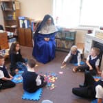 Play-time is learning time, too! In Rathdrum, Idaho, Sr. Mary Josephine supervises the kindergarten class.