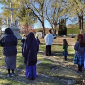 Fr. Letourneau and the Sisters and parishioners of St. Theresa’s Parish in Oakland, Maine, visit a local Catholic cemetery to pray for the Holy Souls. Praying for the Holy Souls