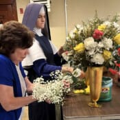 With only two Sisters on a mission, every talent you have is called into action, and perhaps some you did not know you had. Sr. Mary Cecilia helps arrange flowers for the altar for a special feast.