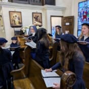 Sisters and students sing during Mass at Our Lady of the Rosary Church in Middleville, Michigan.