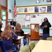 Sister visits one of the classrooms and tells the students about her journey to traditional Catholicism from being a Novus Ordo Sister in Nigeria.