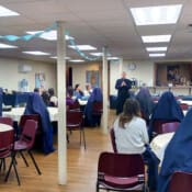 Fr. Benedict addresses Sodality members of Mary Immaculate Queen Church at their 10-year anniversary celebration. After several years of inactivity, the Sodality was resurrected in 2015.