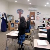 Prayers before classes are a normal part of every CMRI school — more fervent, of course, on test days. (Sr. Madeleine Marie and her class at Mary Immaculate Queen Academy, Rathdrum, Idaho.) Prayers before classes are a normal part of every CMRI school — more fervent, of course, on test days. (Sr. Madeleine Marie and her class at Mary Immaculate Queen Academy, Rathdrum, Idaho.)