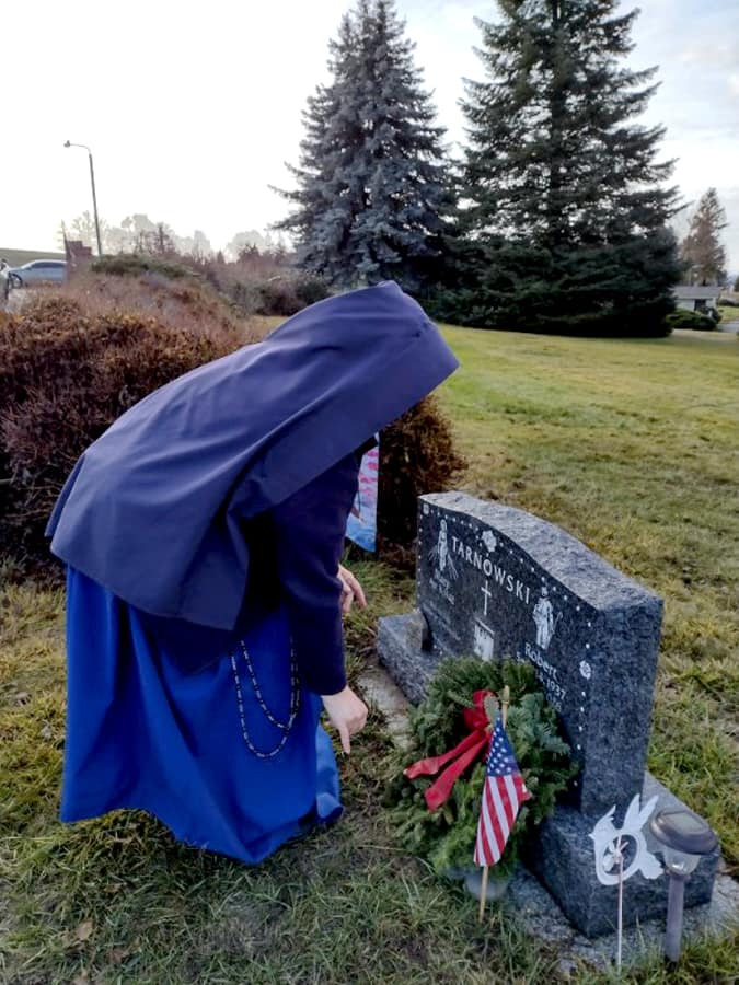 During November we took part in an event honoring veterans in our cemetery. Sr. Marie Vianney places a wreath on her father’s grave.
