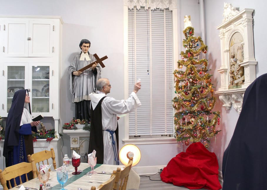 Blessing of the Christmas tree in the convent refectory.