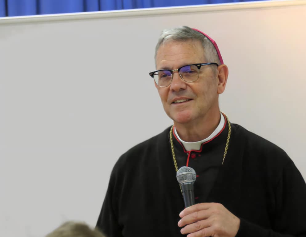 Bishop Pivarunas listens to a question from the audience.